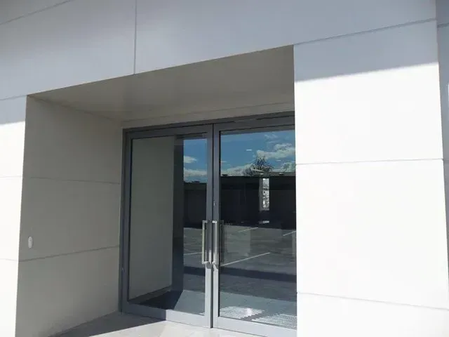 Dual-entry Glass Door For Versatile Access — Capitol Glass in Taminda, NSW