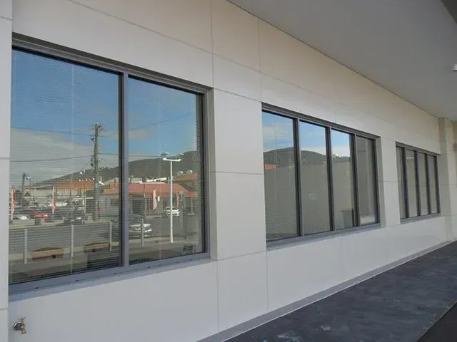 High End Commercial Sliding Glass Window — Capitol Glass in Taminda, NSW