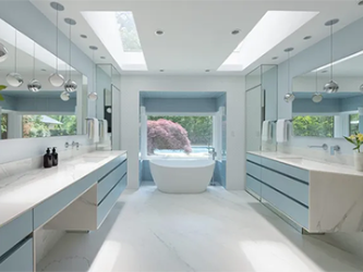 A bathroom with two sinks and a bathtub