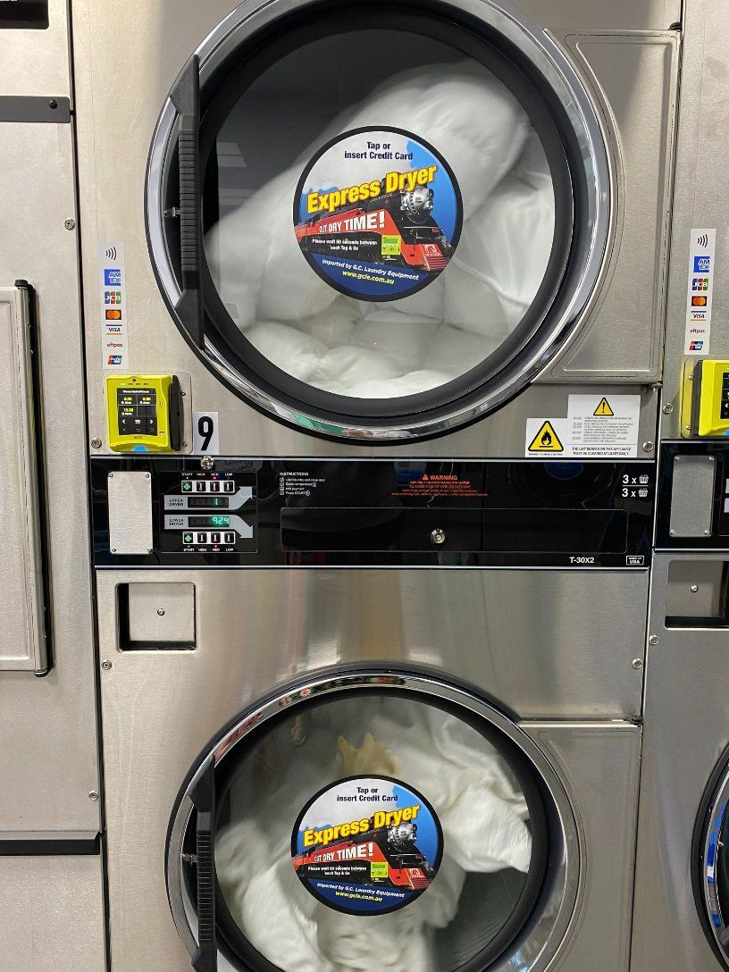 A Laundromat with A Stack of Washers and Dryers — Ezy Laundrette Diamond Beach in Diamond Beach, NSW