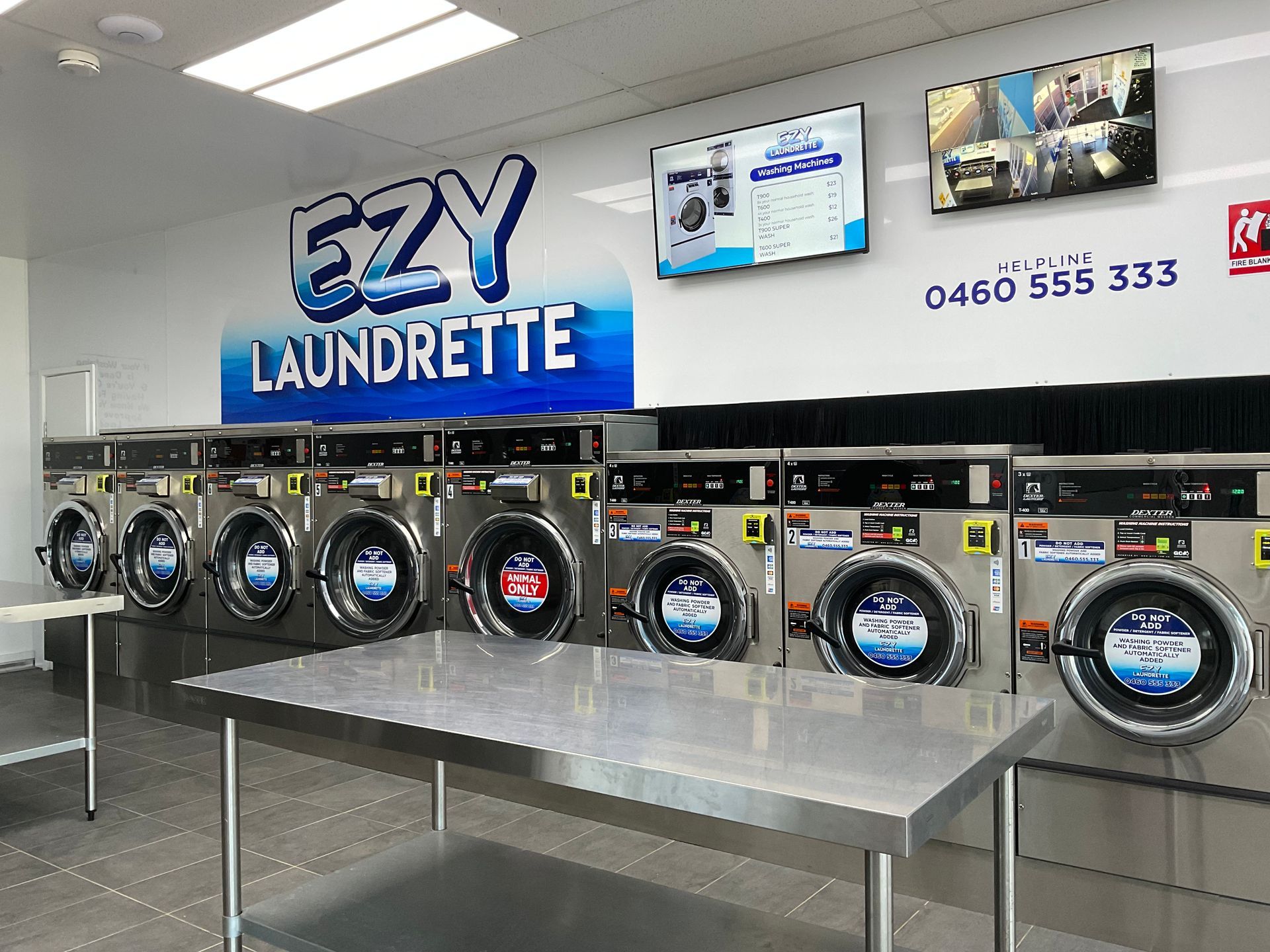 A Laundromat With Stainless Steel Washing Machines — Ezy Laundrette Diamond Beach in Diamond Beach, NSW