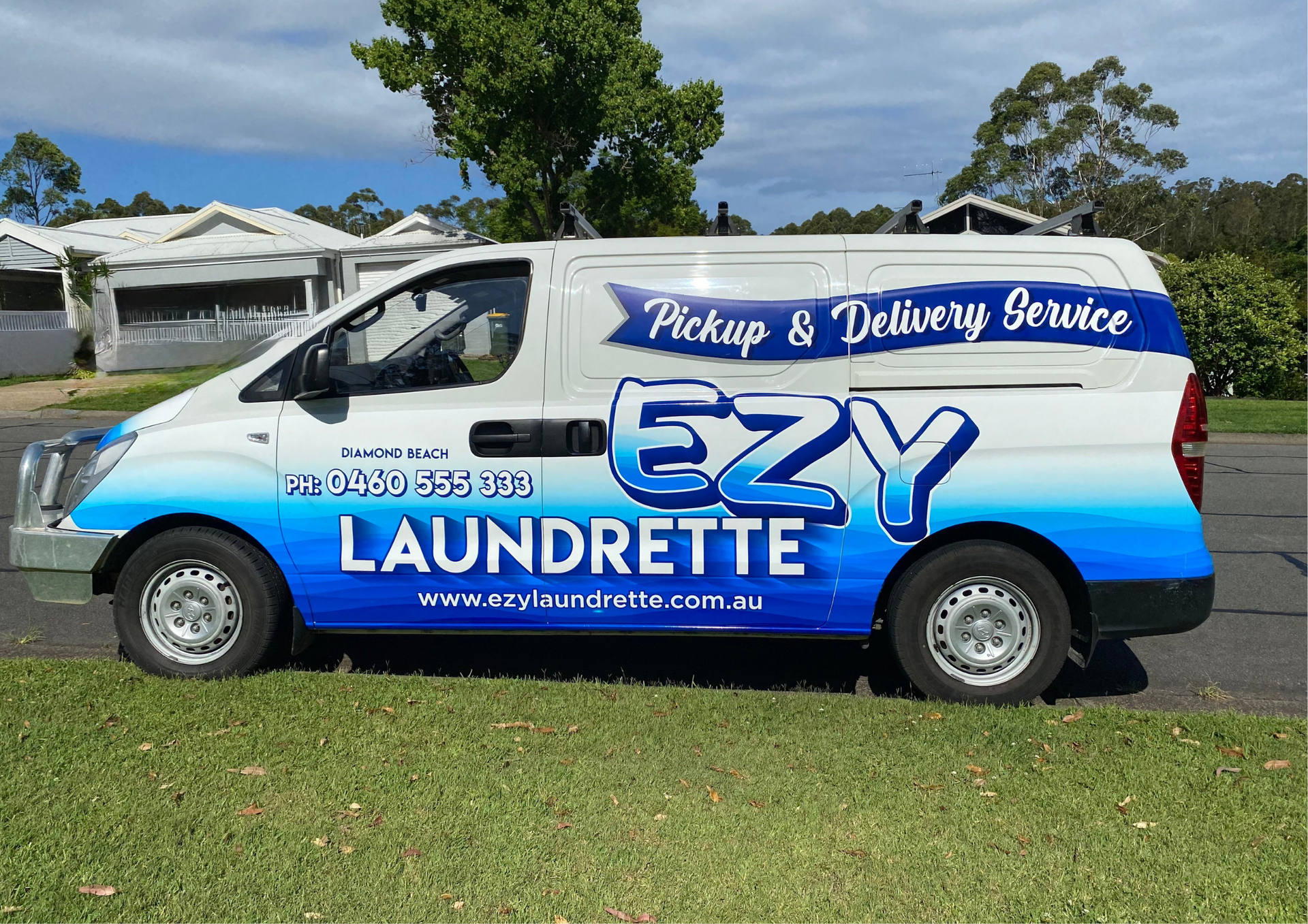 White and Blue Van With "EZY Laundrette" on the Side — Ezy Laundrette Diamond Beach in Diamond Beach, NSW
