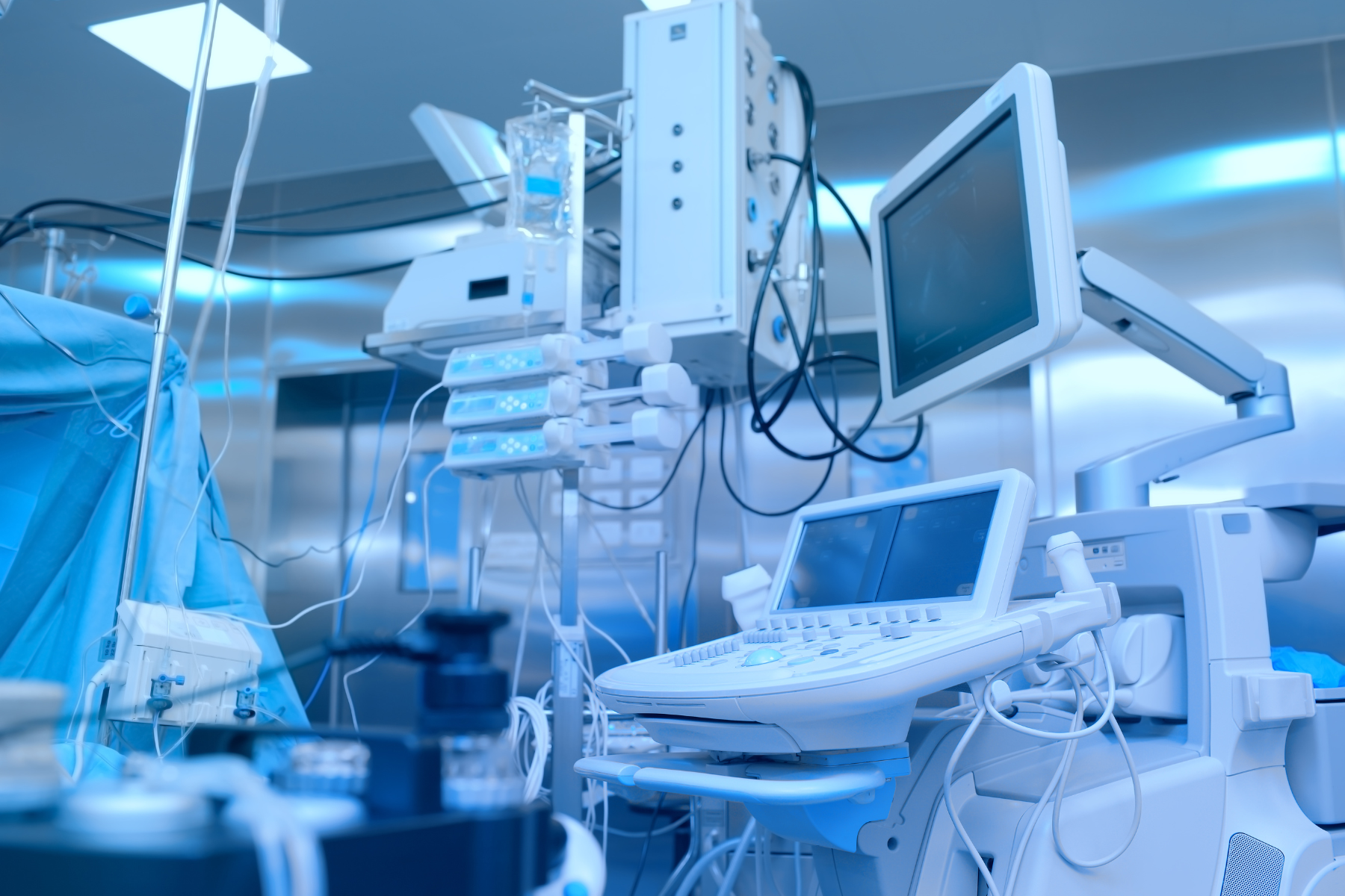 An operating room in a hospital with a lot of medical equipment.