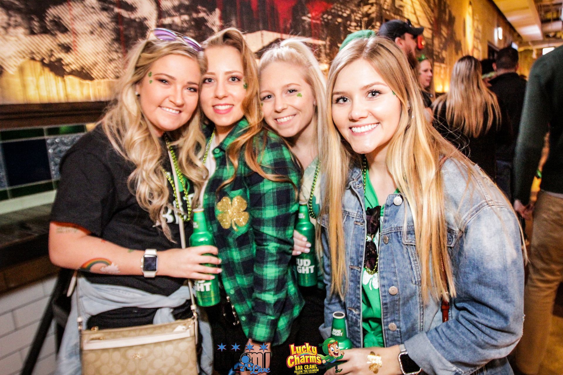 A group of young women are posing for a picture together.