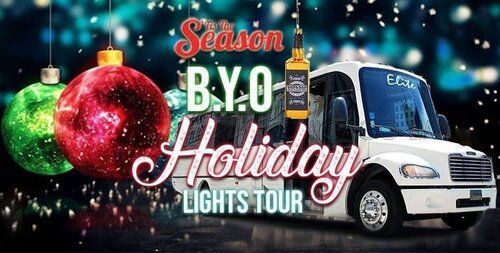 A white van is parked in front of a christmas tree.
