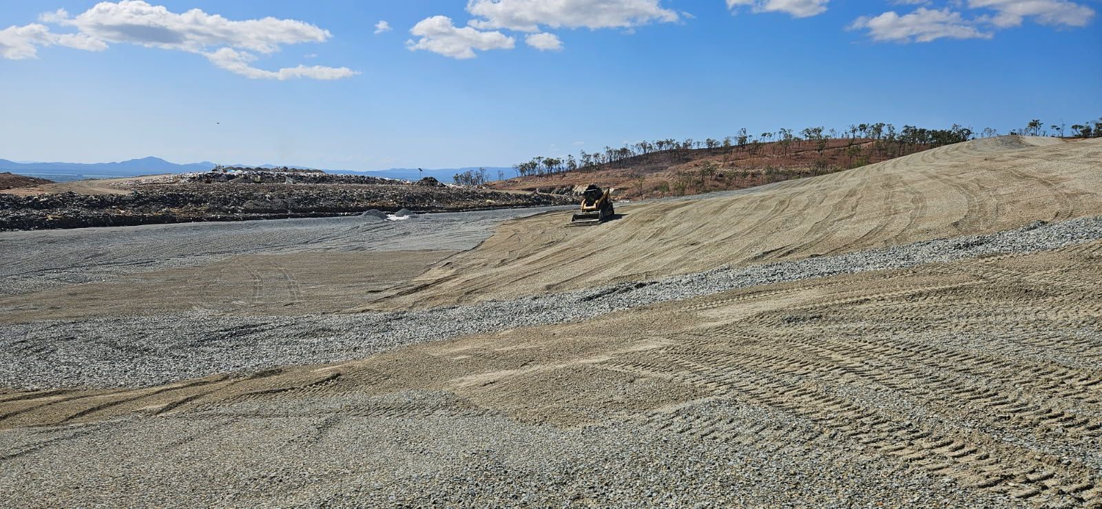 A Landscape View of a Graded Gravel Area Under — STJ Earthmoving in Mareeba, QLD