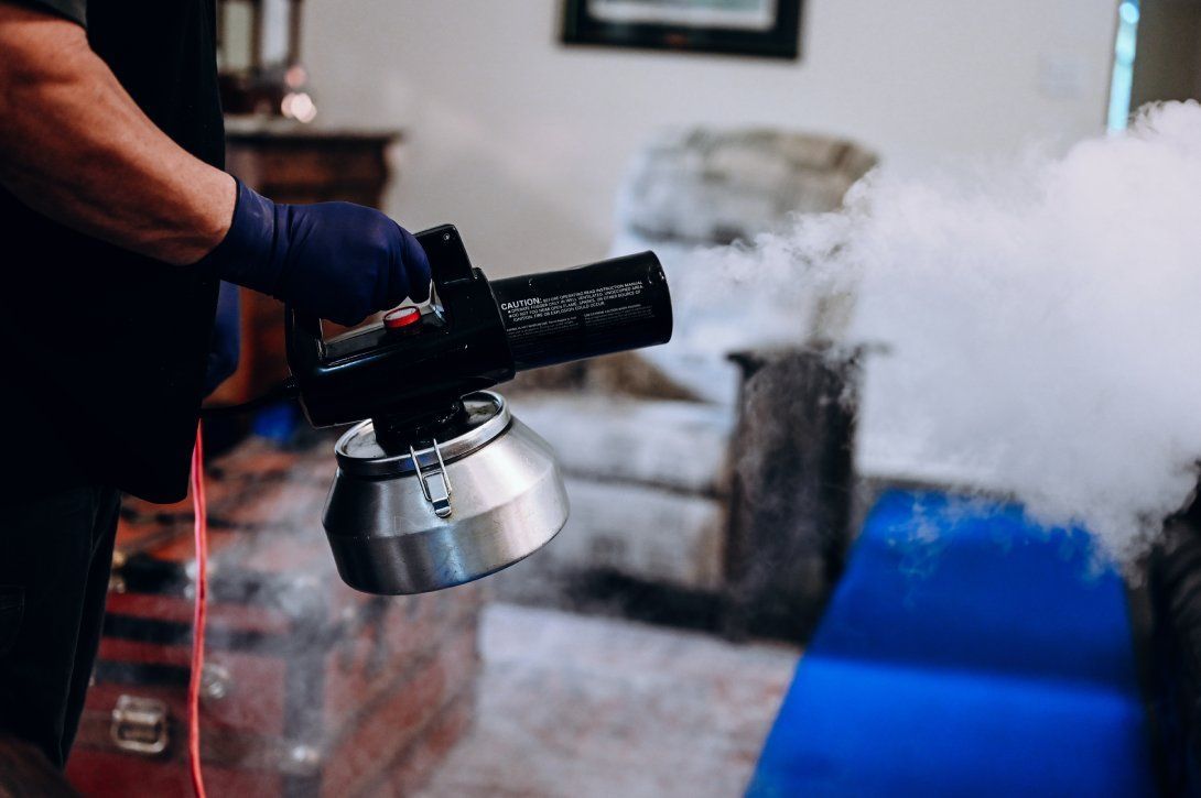 Professional odor control service using a thermal fogger to eliminate odors in a living space.