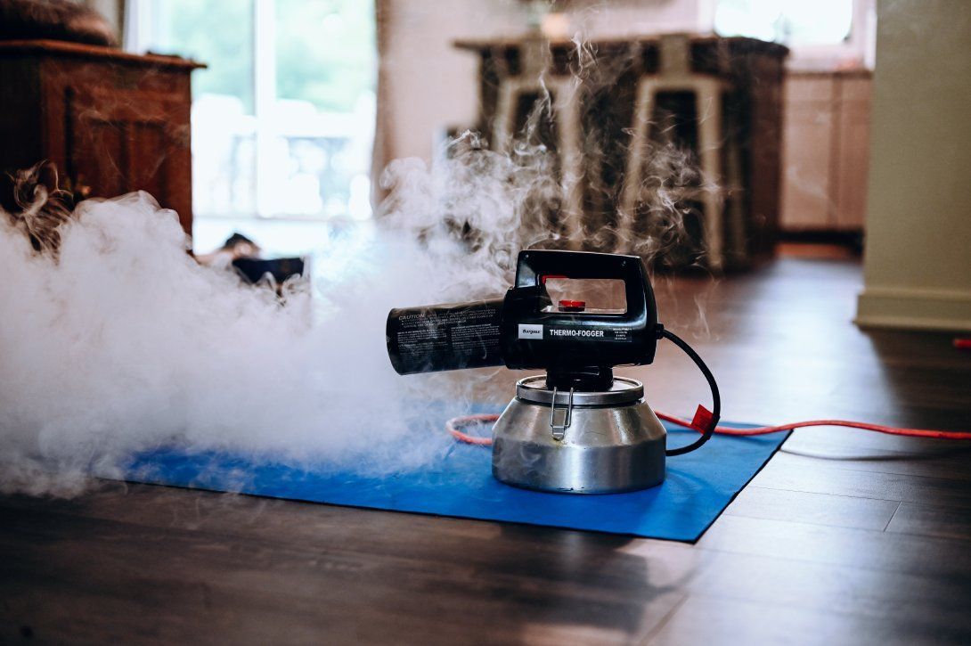 High-powered odor neutralizing fogger eliminating smoke and pet odors from indoor spaces.