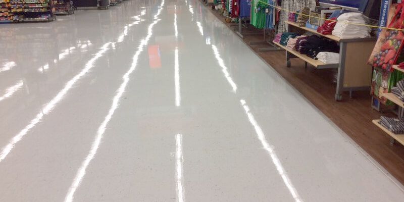 Retail floor restoration with professional VCT stripping and waxing services for a clean, slip-resistant finish.