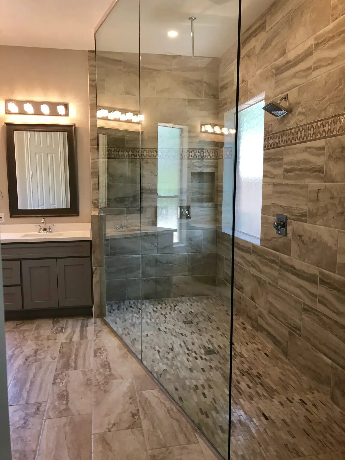 Beautiful Custom Remodeled Bathroom with Glass Doors
