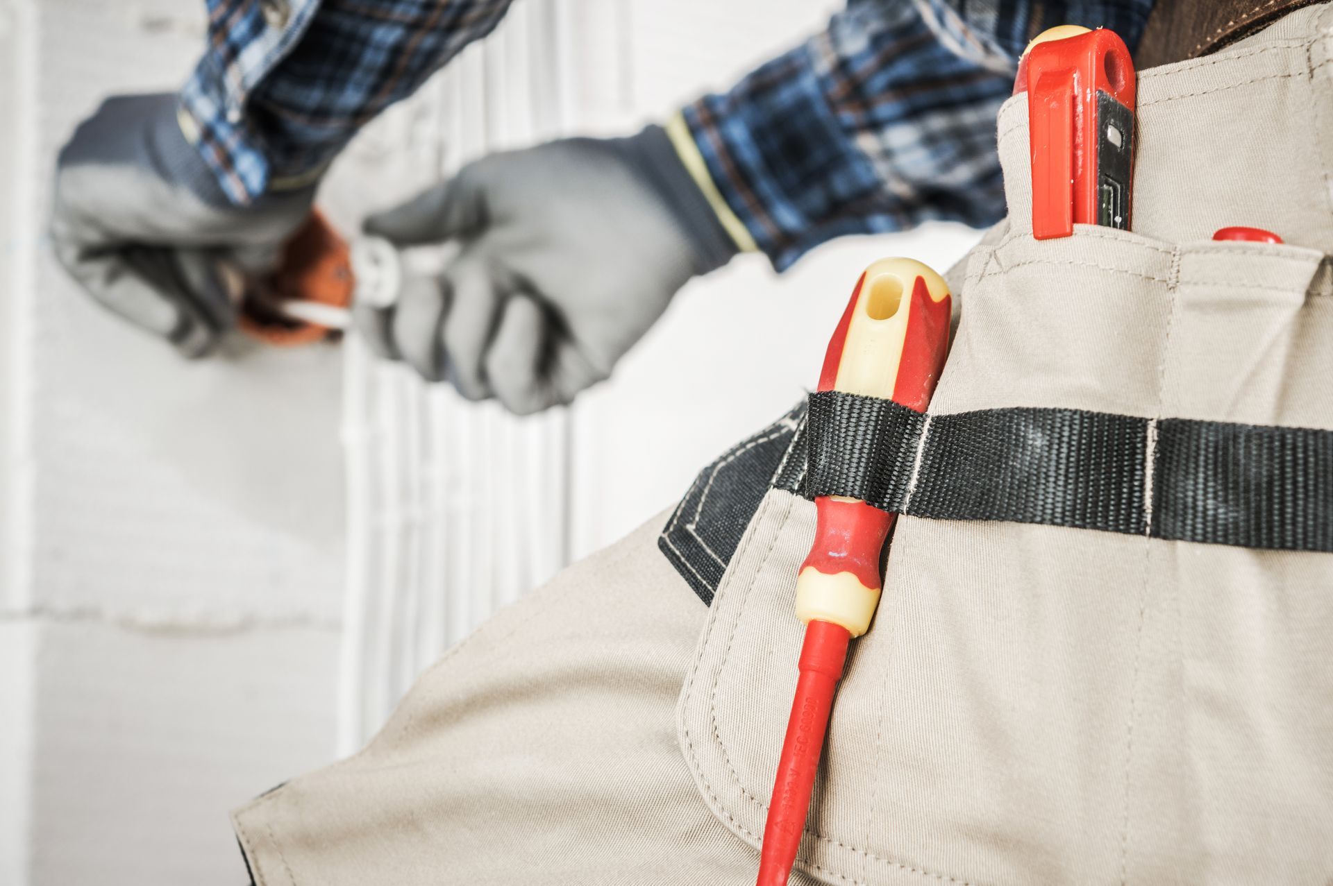 A&J Remodel and Construction team member performing handyman repairs in a Houston home