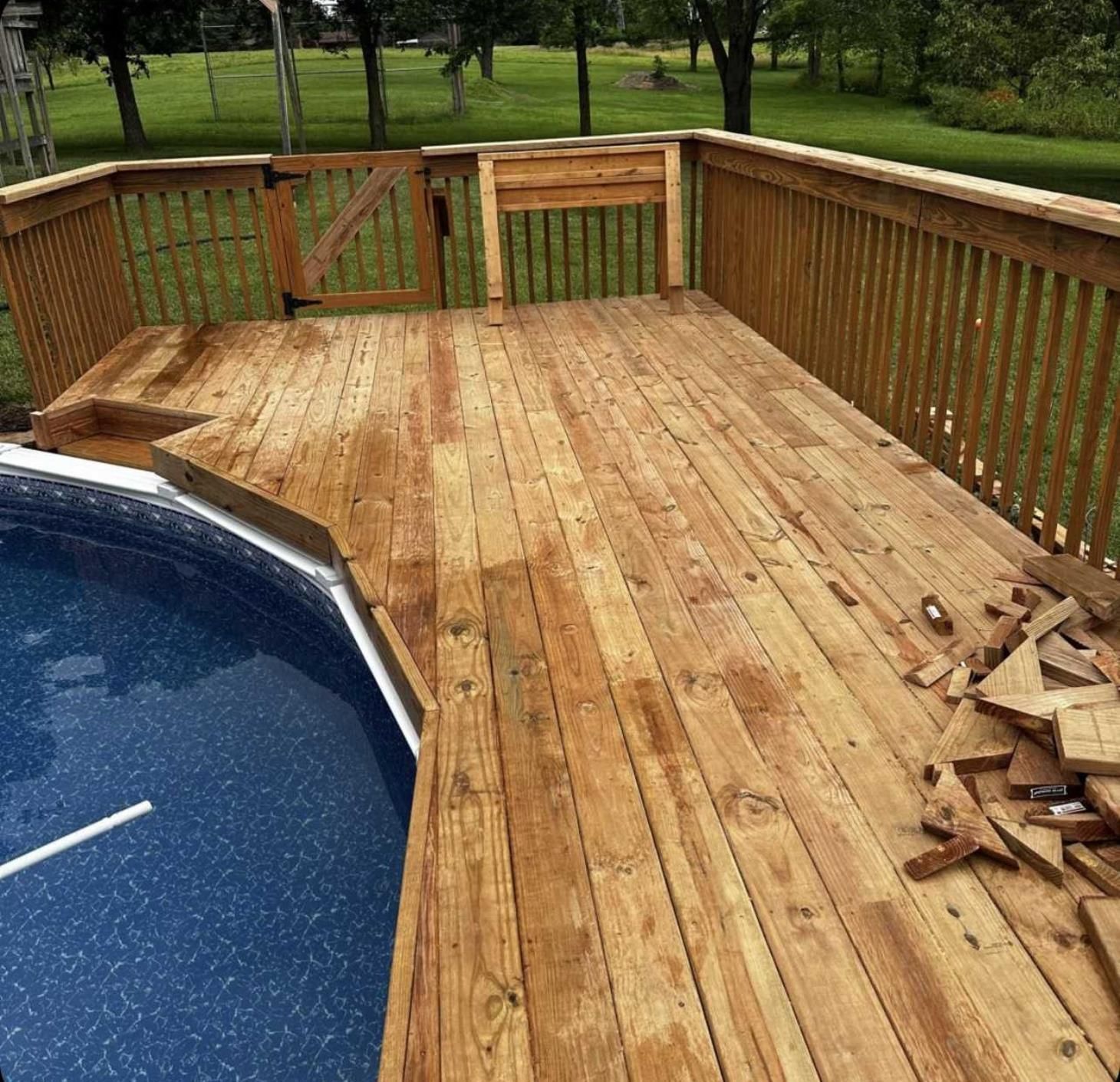 a house with a large deck and sliding glass doors