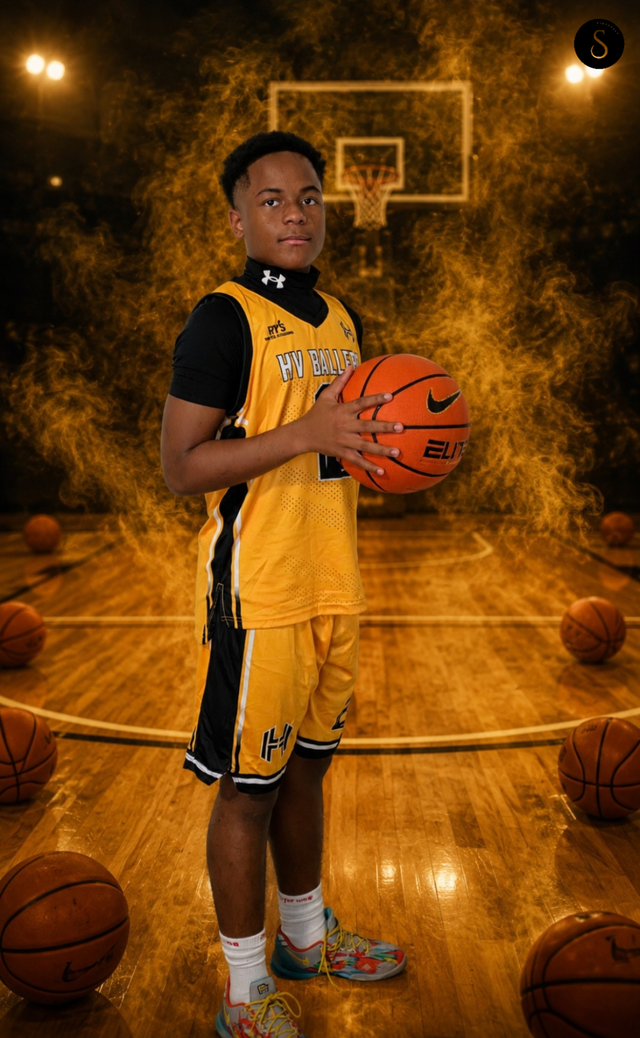 HV Ballers Elite basketball player wearing the gold team jersey and gold team shorts