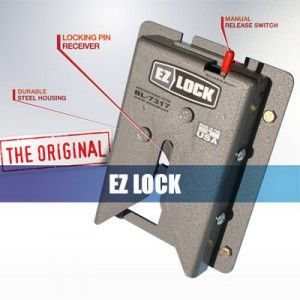 A metal EZ Lock with a locking pin receiver, manual release switch, and durable steel housing.
