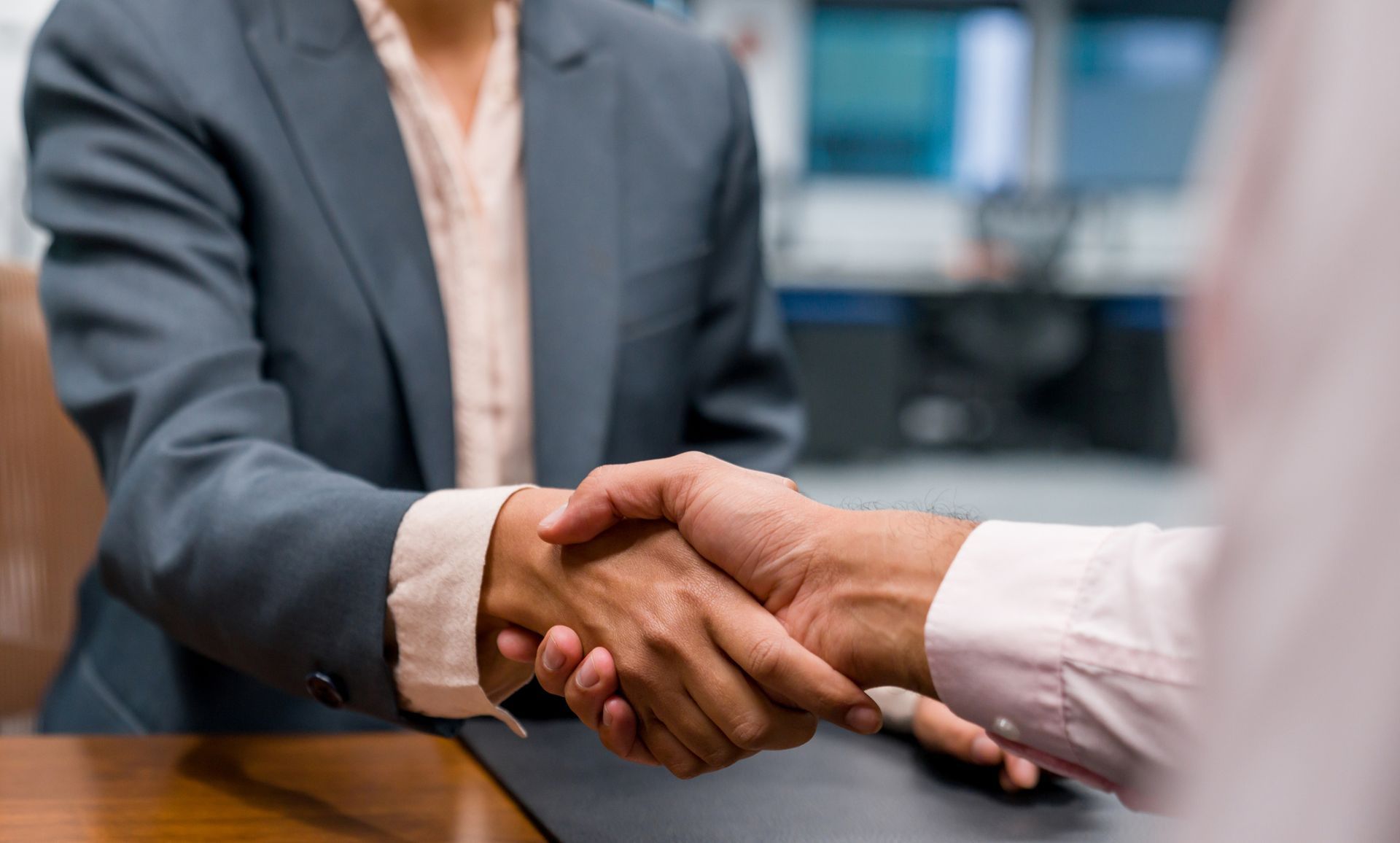 Lawyer and Client Deal with A Handshake | Addison, TX | Geary, Porter & Donovan, P.C.