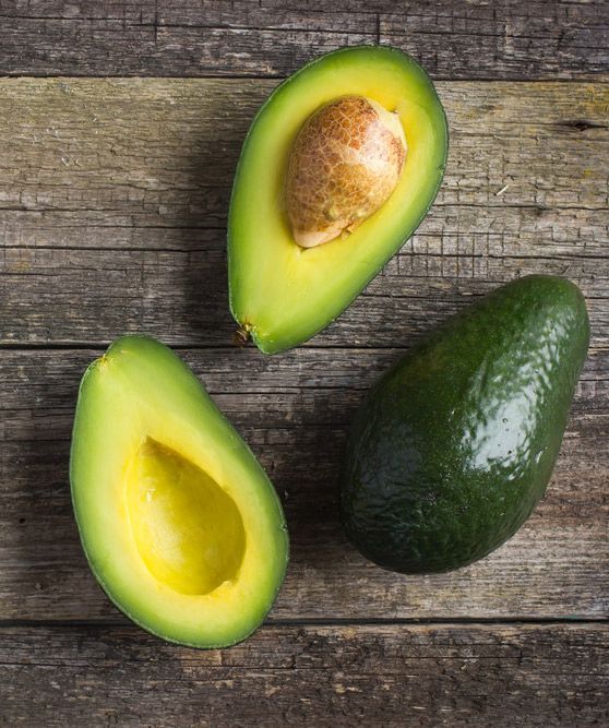 Fresh Organic Avocado On Old Wooden Table — Fresh to Door In Fyshwick ACT