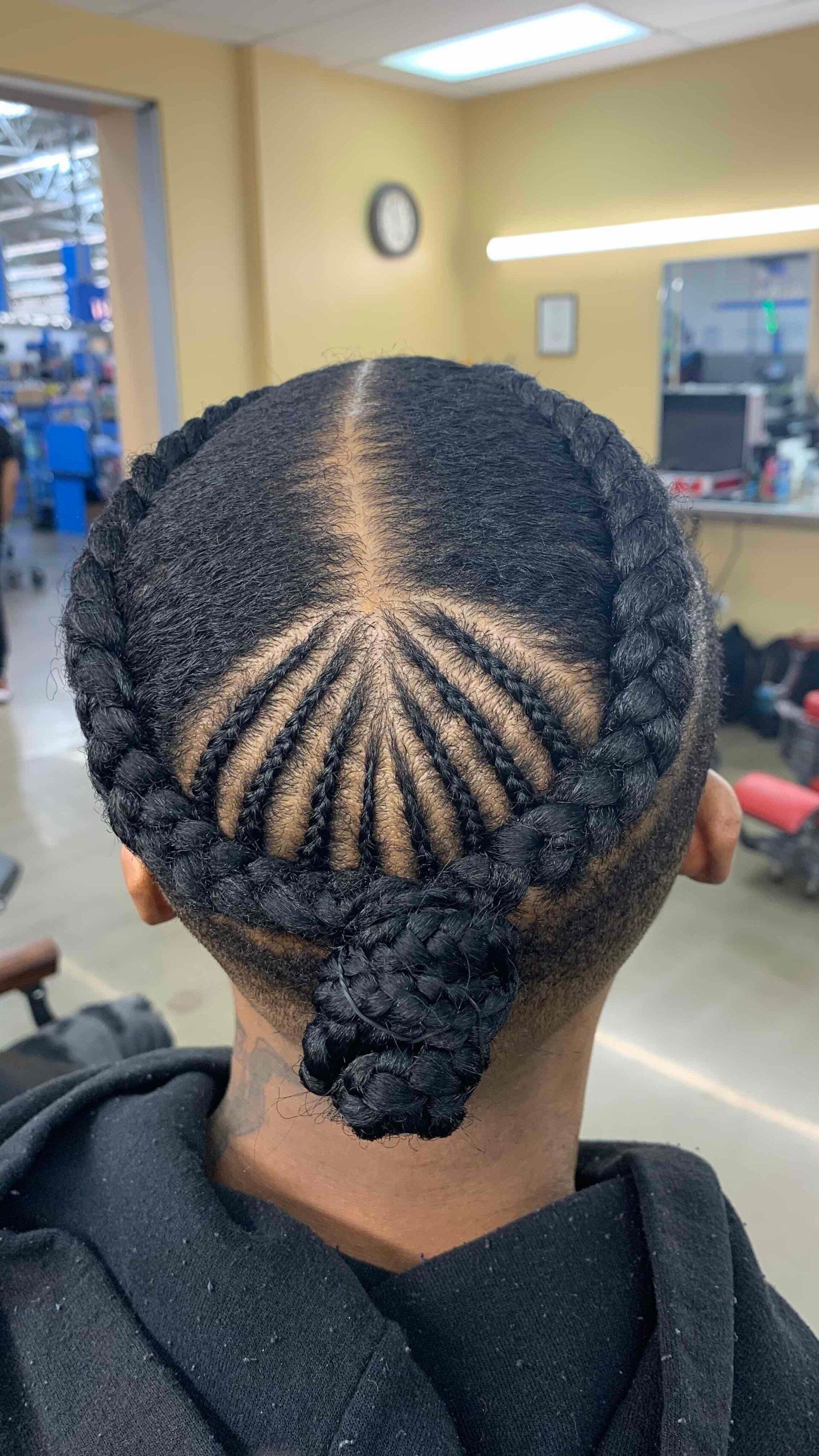 Stylist braiding hair