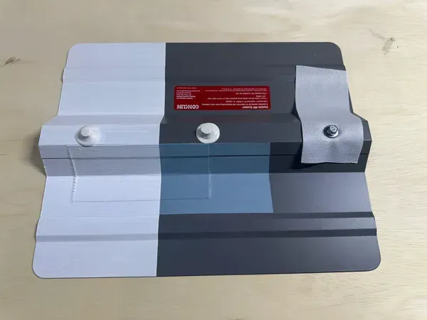 A piece of paper is sitting on top of a wooden table.