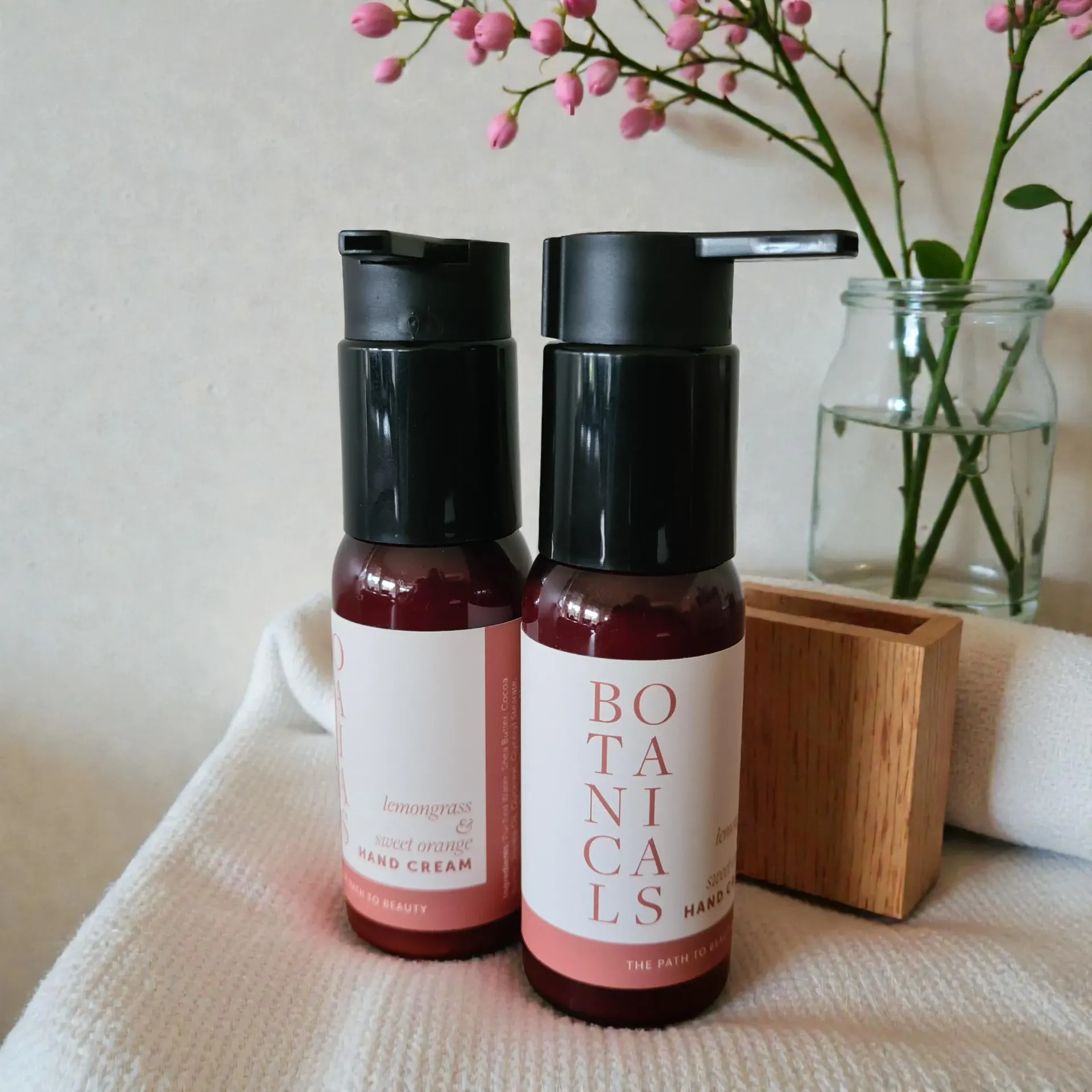 Two dark-capped bottles of 