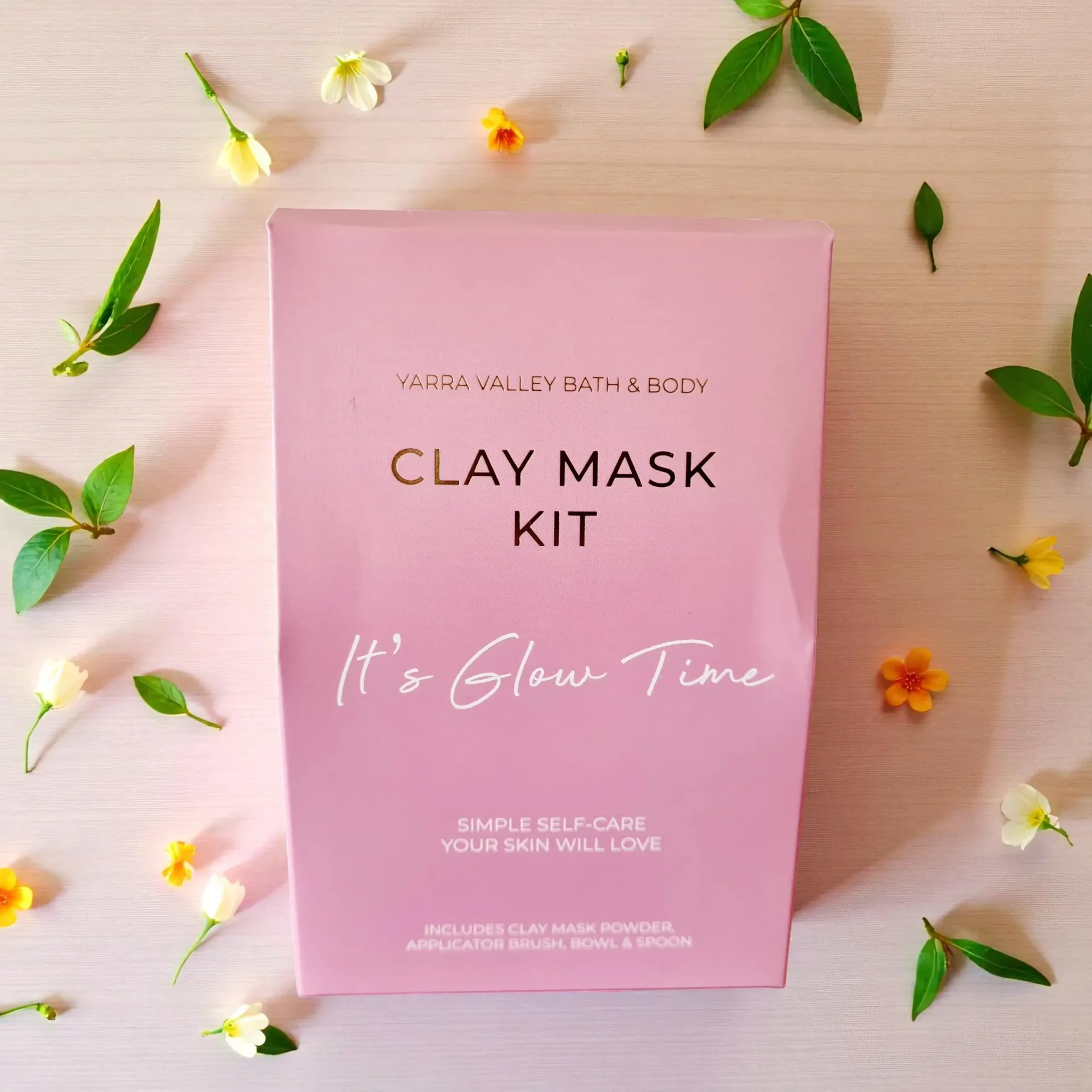 Pink clay mask kit box with text 
