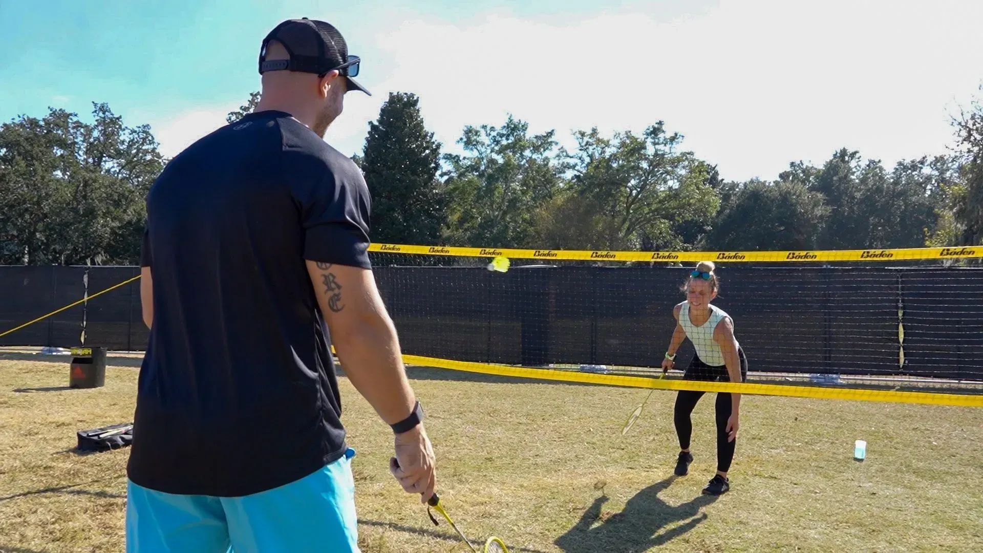 Man and Woman Playing Badminton — North Charleston, SC — Access Portable Toilets