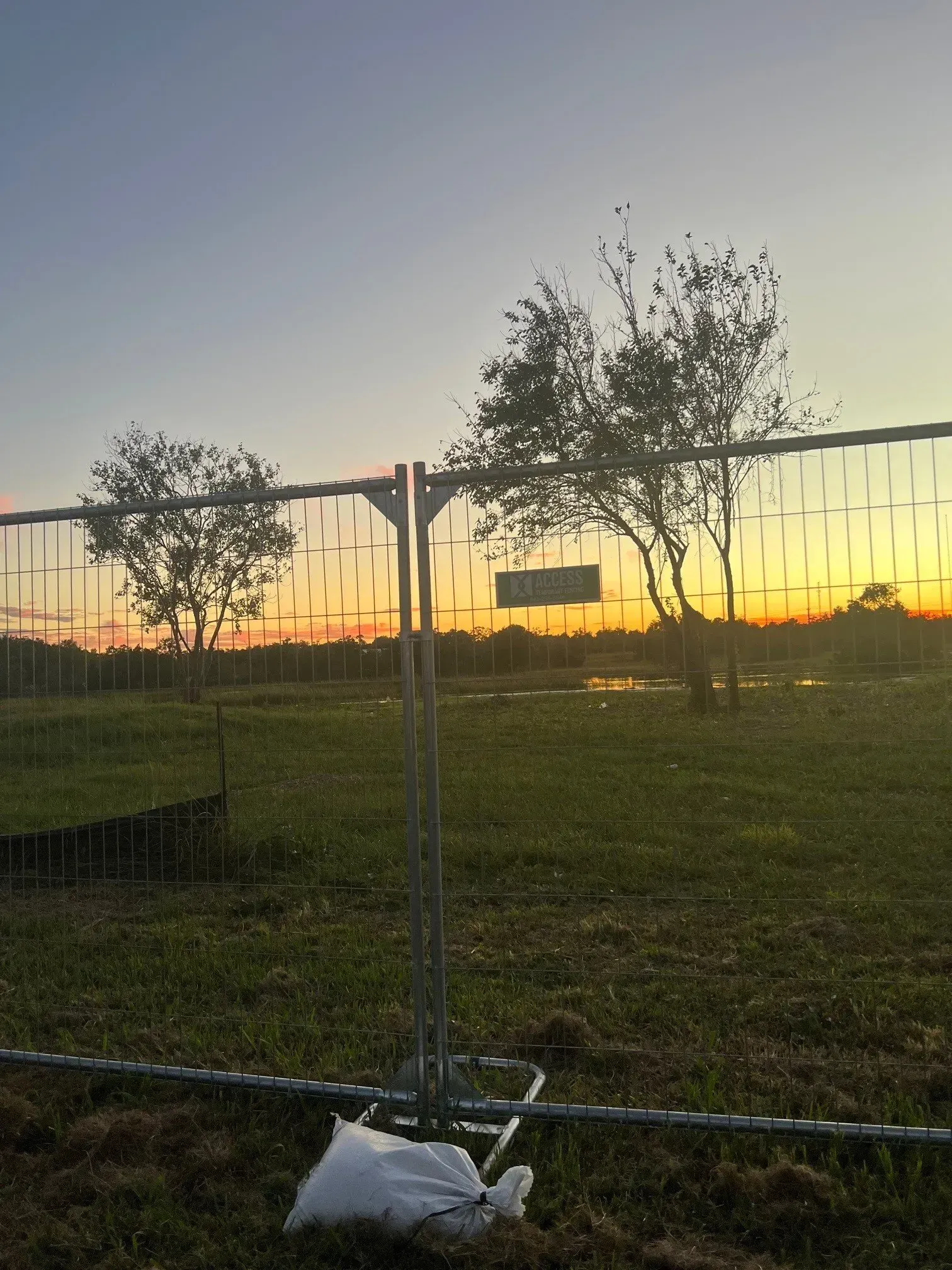 Fence with Sunset View — North Charleston, SC — Access Portable Toilets
