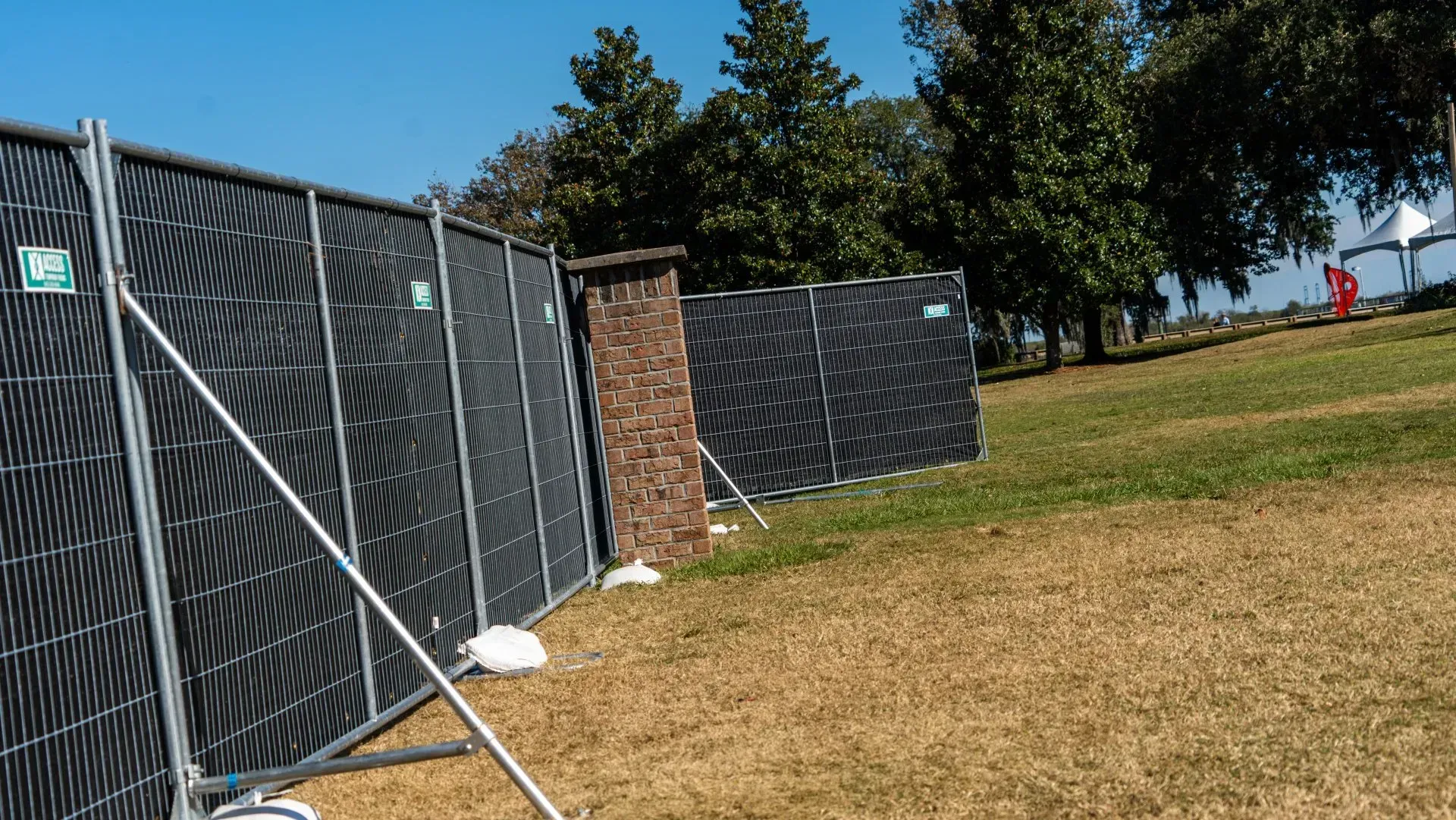 Temporary Fence with Brick Support — North Charleston, SC — Access Portable Toilets