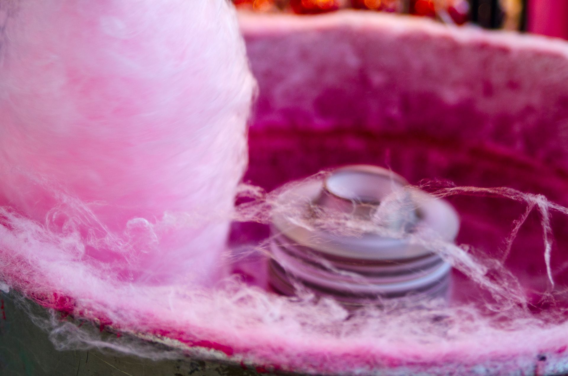 Pink cotton sweet in candy machine.