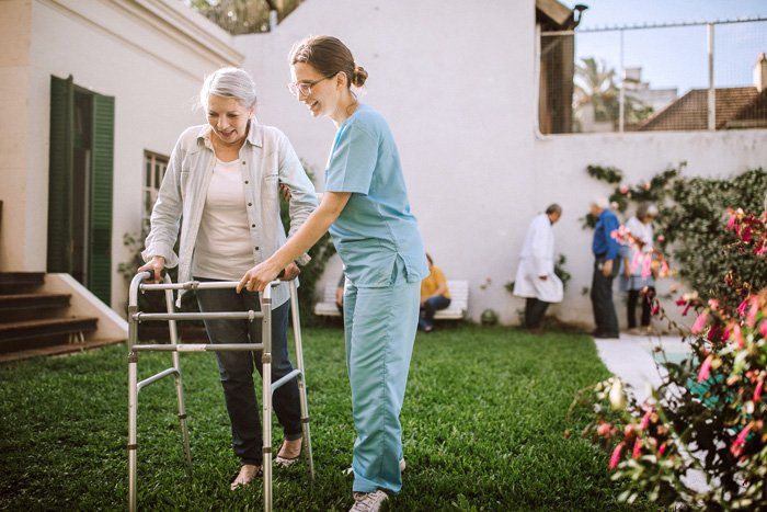 Nurse Helping a Senior Woman — Farmville, NC — A Special Place Home Care