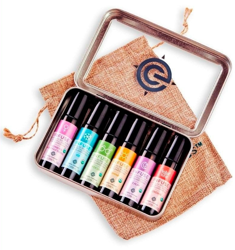 Women Holding Small Bottles — Wilmington, NC — 2C Wellness with Ceci