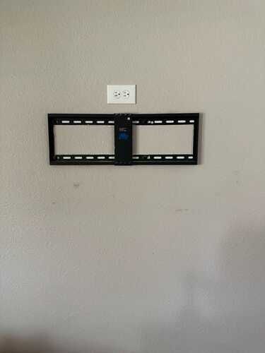 TV wall mount installation by home audio installers and handyman services in DFW