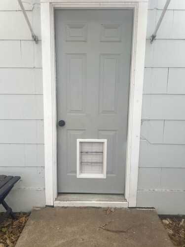 Exterior door installation with pet access by professional handyman door installer in DFW