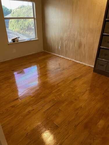 Refinished hardwood floor showcasing home remodeling and handyman services in the DFW Area