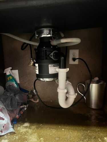 Garbage disposal installation and kitchen plumbing repair by handyman services in the DFW Area