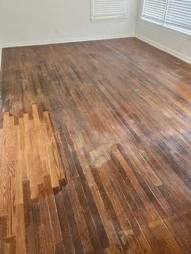 In-progress flooring repair project by remodeling contractors in the DFW Area