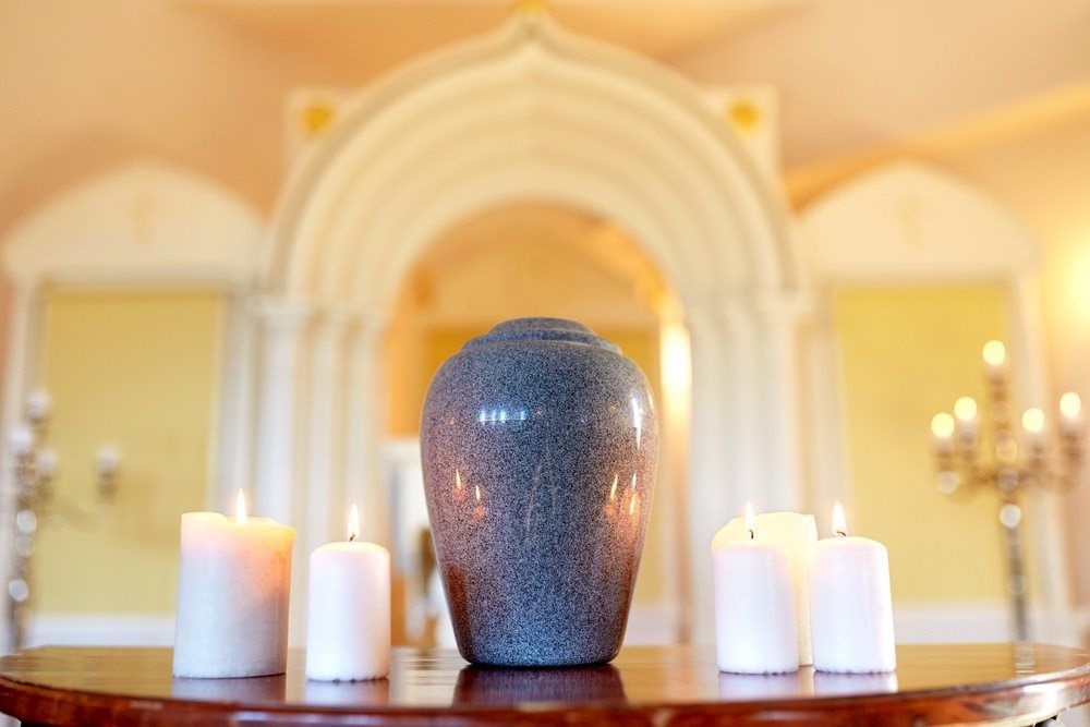 An urn surrounded by candles in Sydney