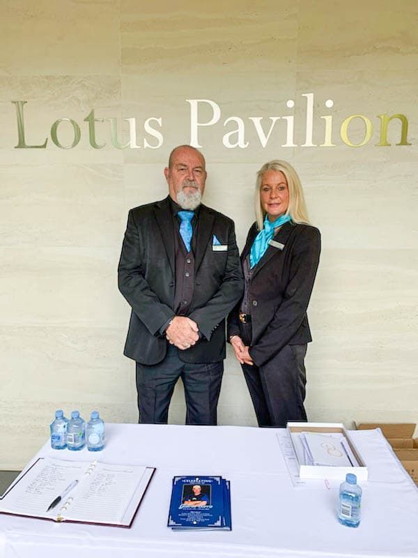 Funeral directors at a funeral service welcoming mourners on the Central Coast — Personalised Cremation Services in The Entrance, NSW