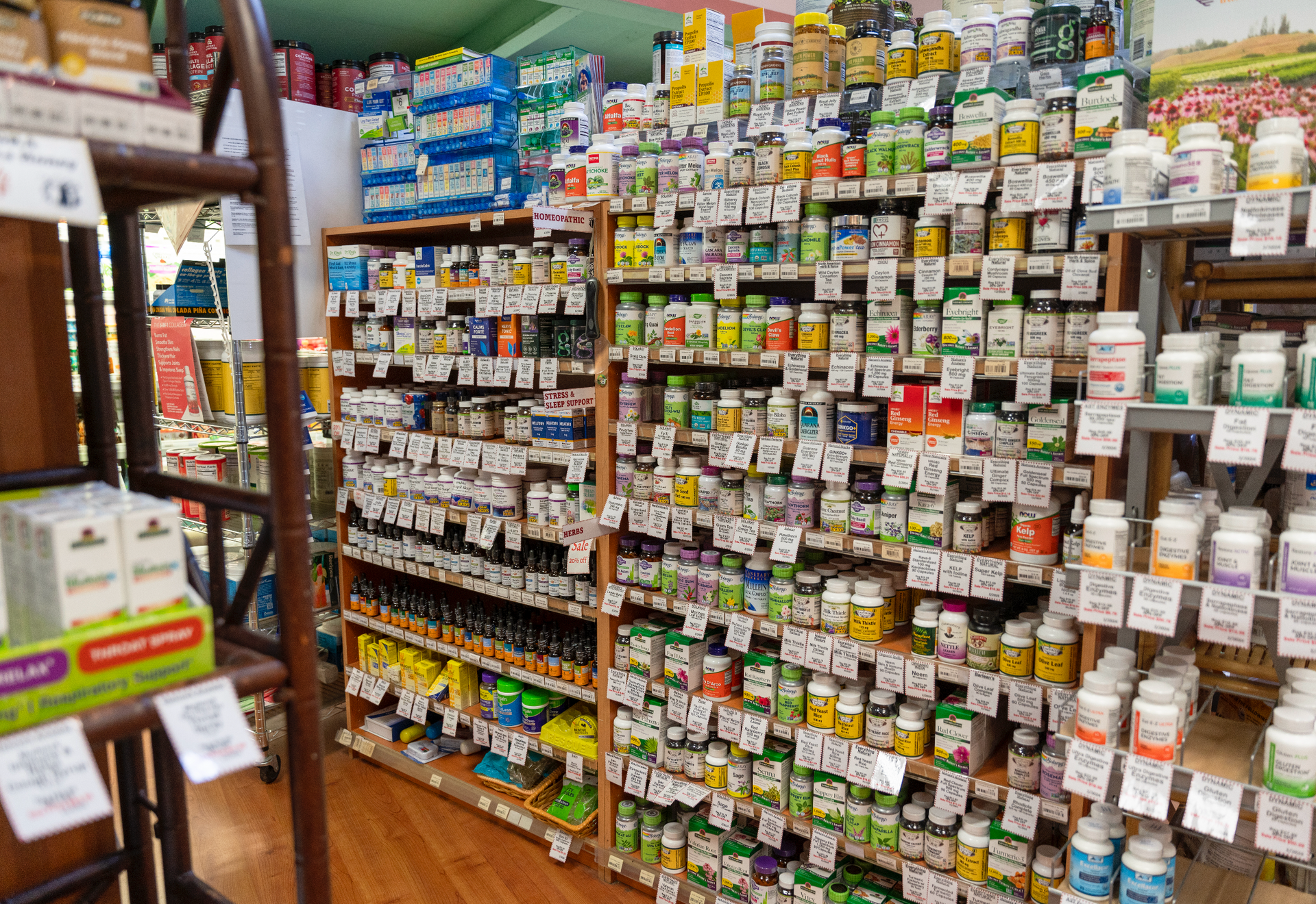 A pharmacy filled with lots of bottles and jars of medicine.