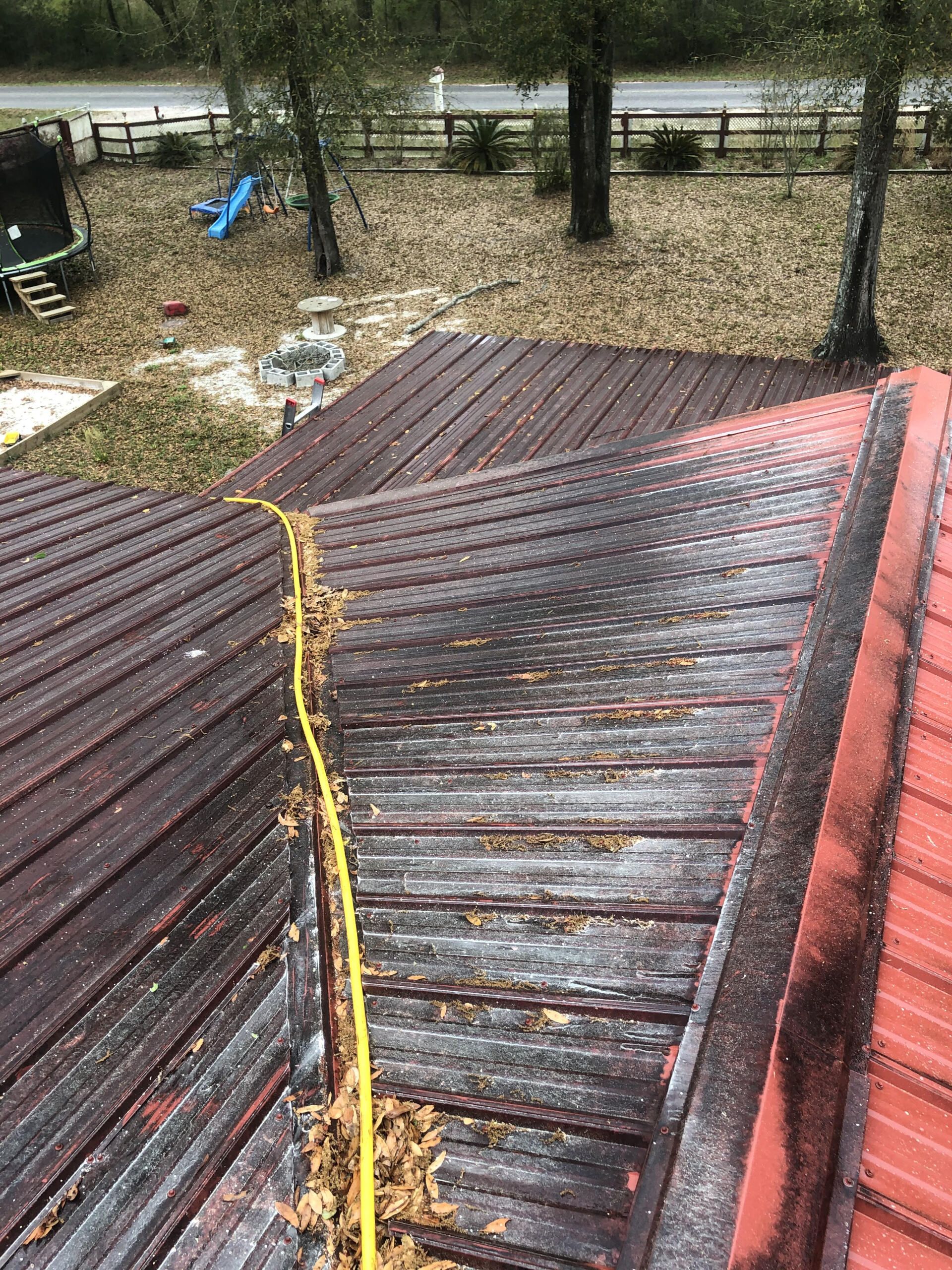 Cleaning Red Metal Roof Before