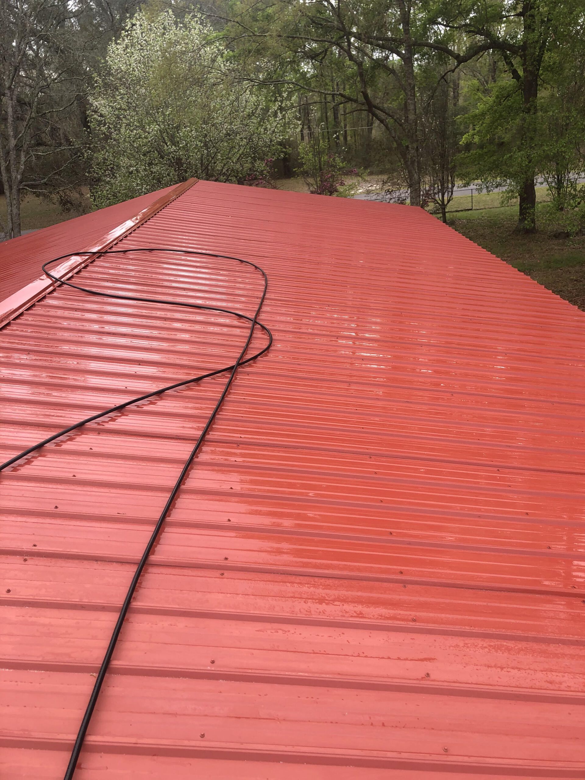 Cleaning Red Metal Roof After