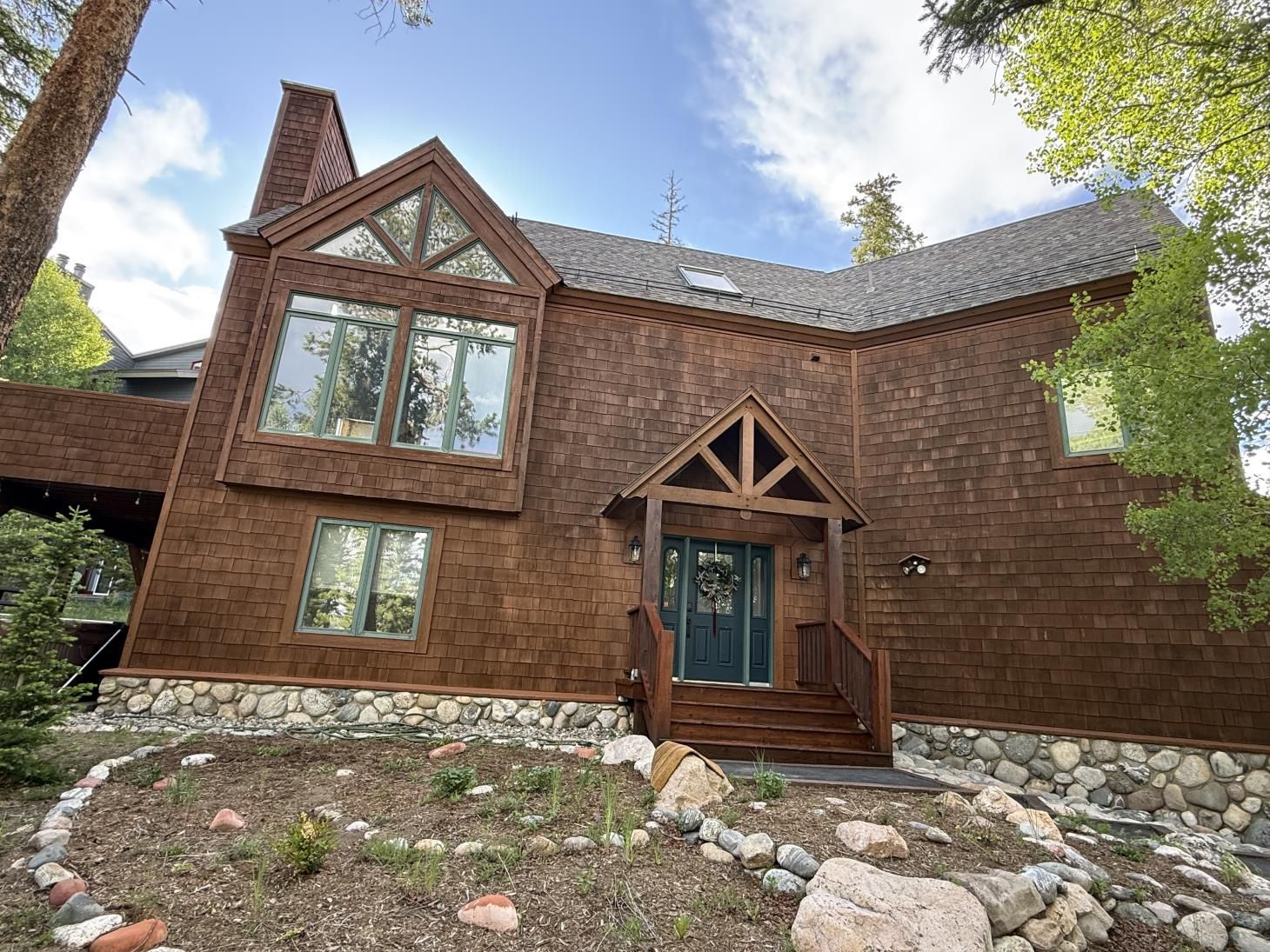 a man is installing a door handle on a wooden door