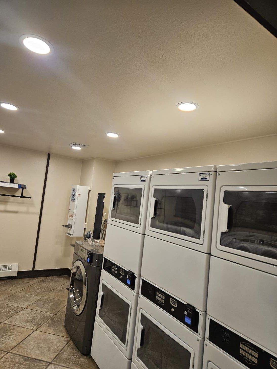 a kitchen with a large island in the middle of the room .