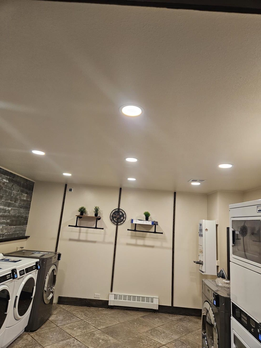 a vacuum cleaner sits in a room that is being remodeled