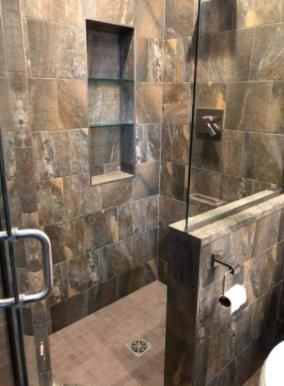 a kitchen with a large island in the middle of the room .