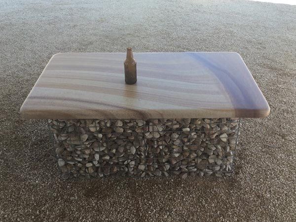 Table With Bottle — Helidon Sandstone Industries In Helidon, QLD