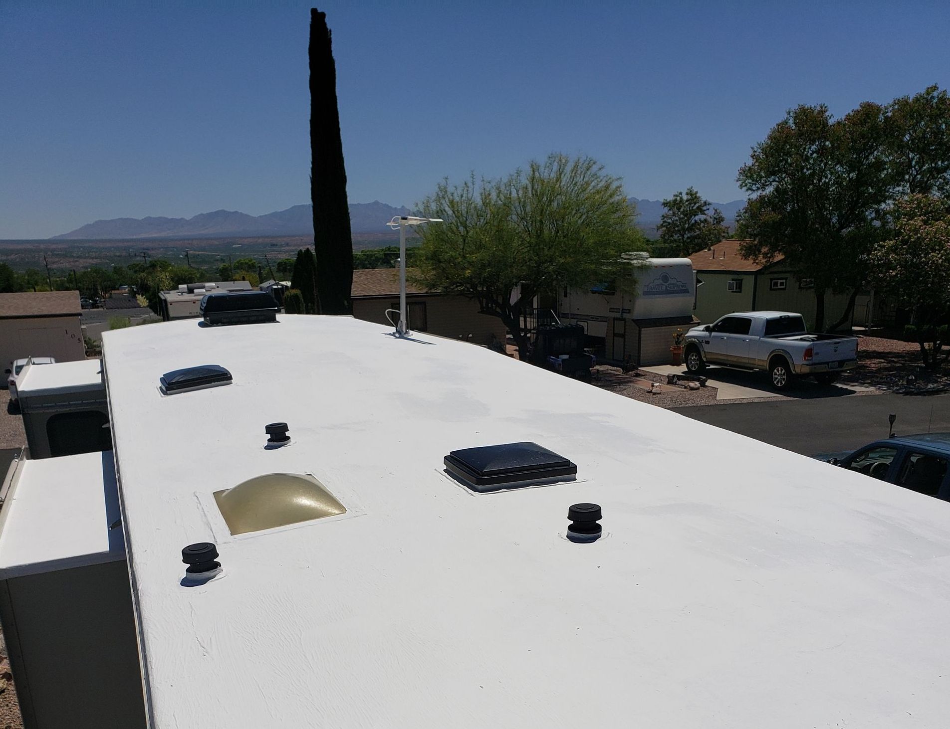 RV Roofing Solutions complete RV roof system stretches and remains flexible up to 300%. The system expands and contracts with your RV. This is important since your RV is constantly moving. 
Included in every RV Roofing Solutions RV roof system is a considerable amount of flexibility and solar UV reflection values, which help offer  additional protection. 
This adds years of protection to your RV.
When cured, the RV roof system forms a permeable membrane, which prevents liquid infiltration, but allows moisture vapor to vent. 
The product we use releases 91% of the sun's heat and makes your RV more energy efficient. 
We specialize in all aspects of RV Roofing Solutions system,s as well as minor and major RV roof repairs.
We are dedicated to providing you with exceptional quality RV roofing products, customer service, and a 100%, 10-year maintenance-FREE, no-leak, labor and material guarantee.