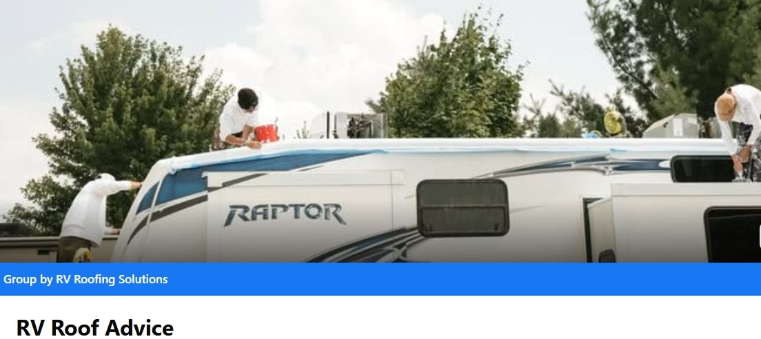 People working on the roof of an RV trailer with