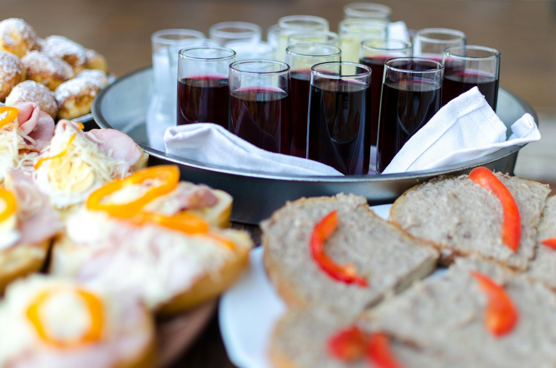 A tray of food and drinks on a table.