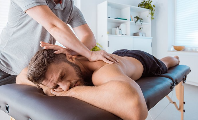 Massaging the Back of the Man — Hanahan, SC — Re-Formed Therapeutic Massage LLC