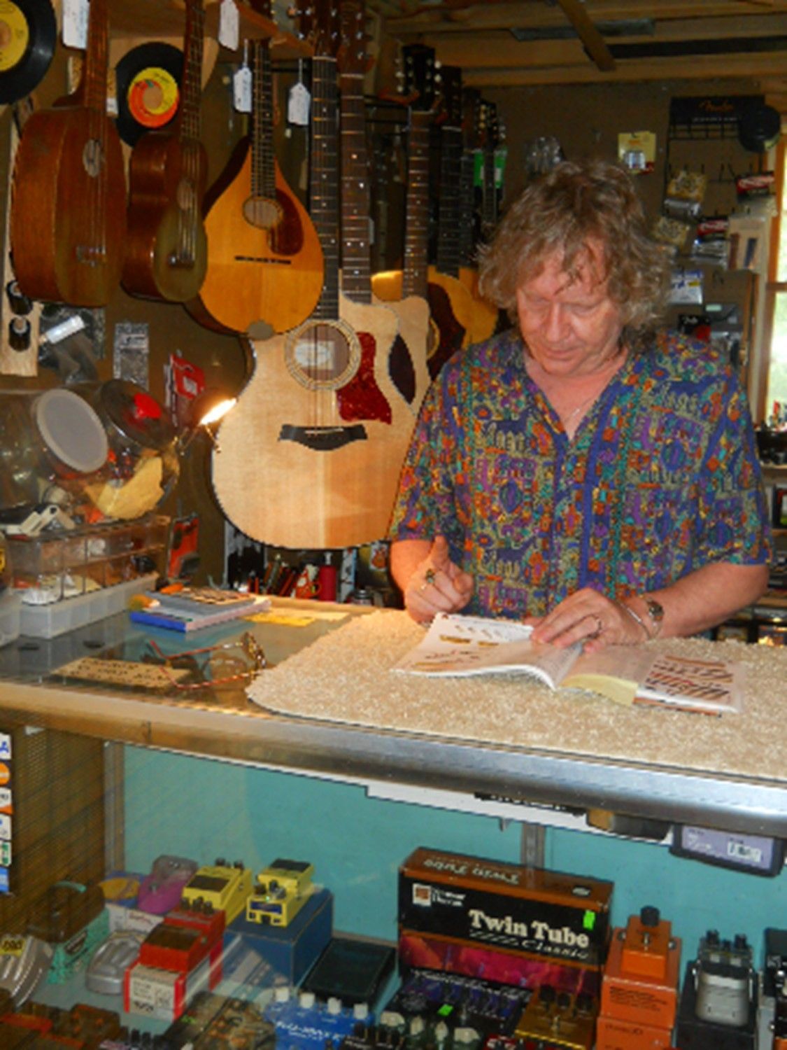 Man Wearing A Valentino Shirt On A Guitar Shop - Ottsville, PA - Tinicum Guitar Barn